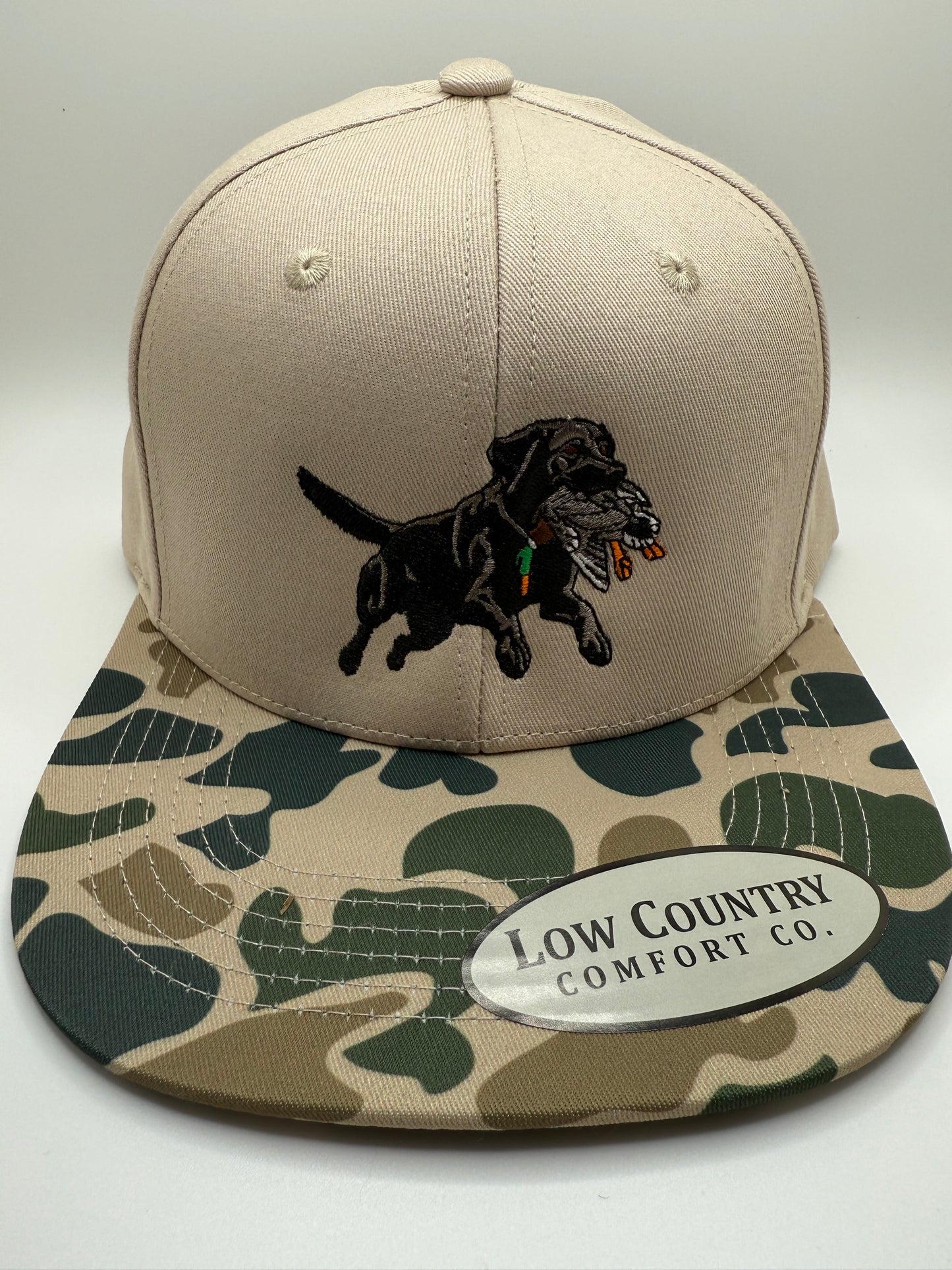 Leaping Lab Embroidered Design on a Riverbed Threads Natural/OS Camo Hat