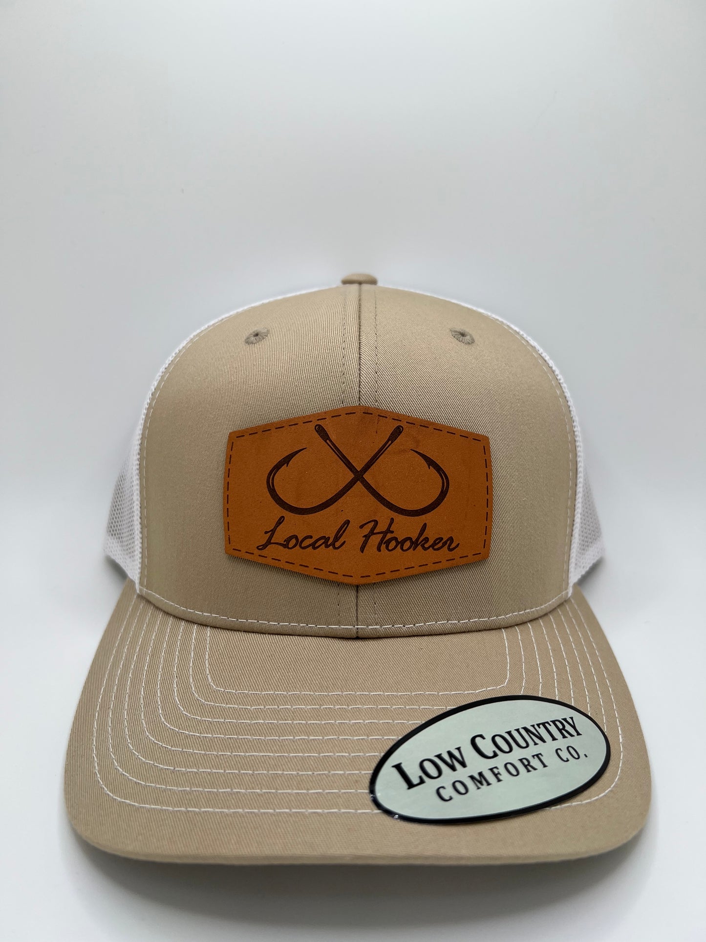 Local Hooker Leather Patch on a Khaki/White Trucker Hat