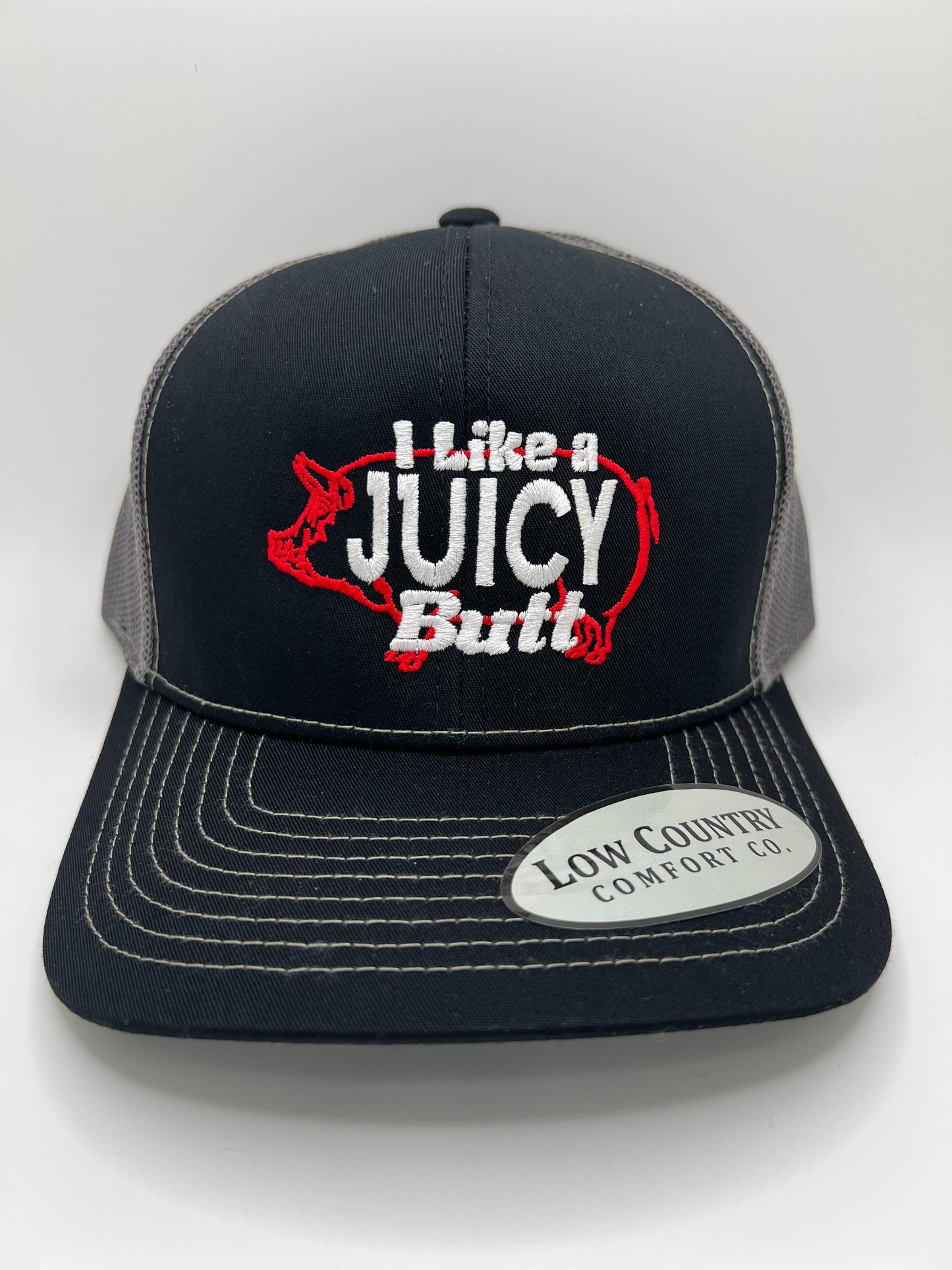 I Like A Juicy Butt Embroidery on a Black/Charcoal Trucker Hat