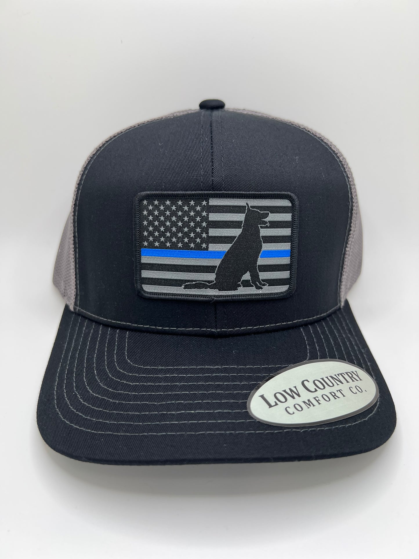 K9 Flag Sublimated Patch on a Black/Charcoal Trucker Hat