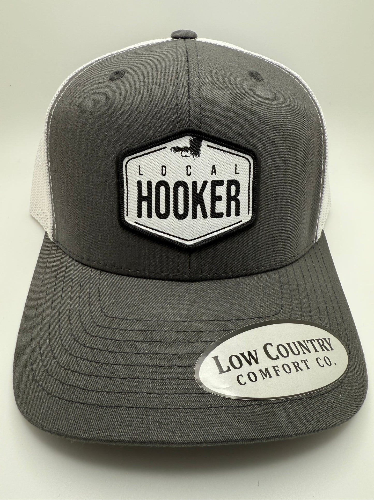 Local Hooker White Sublimated Patch on a Charcoal/White Trucker Hat