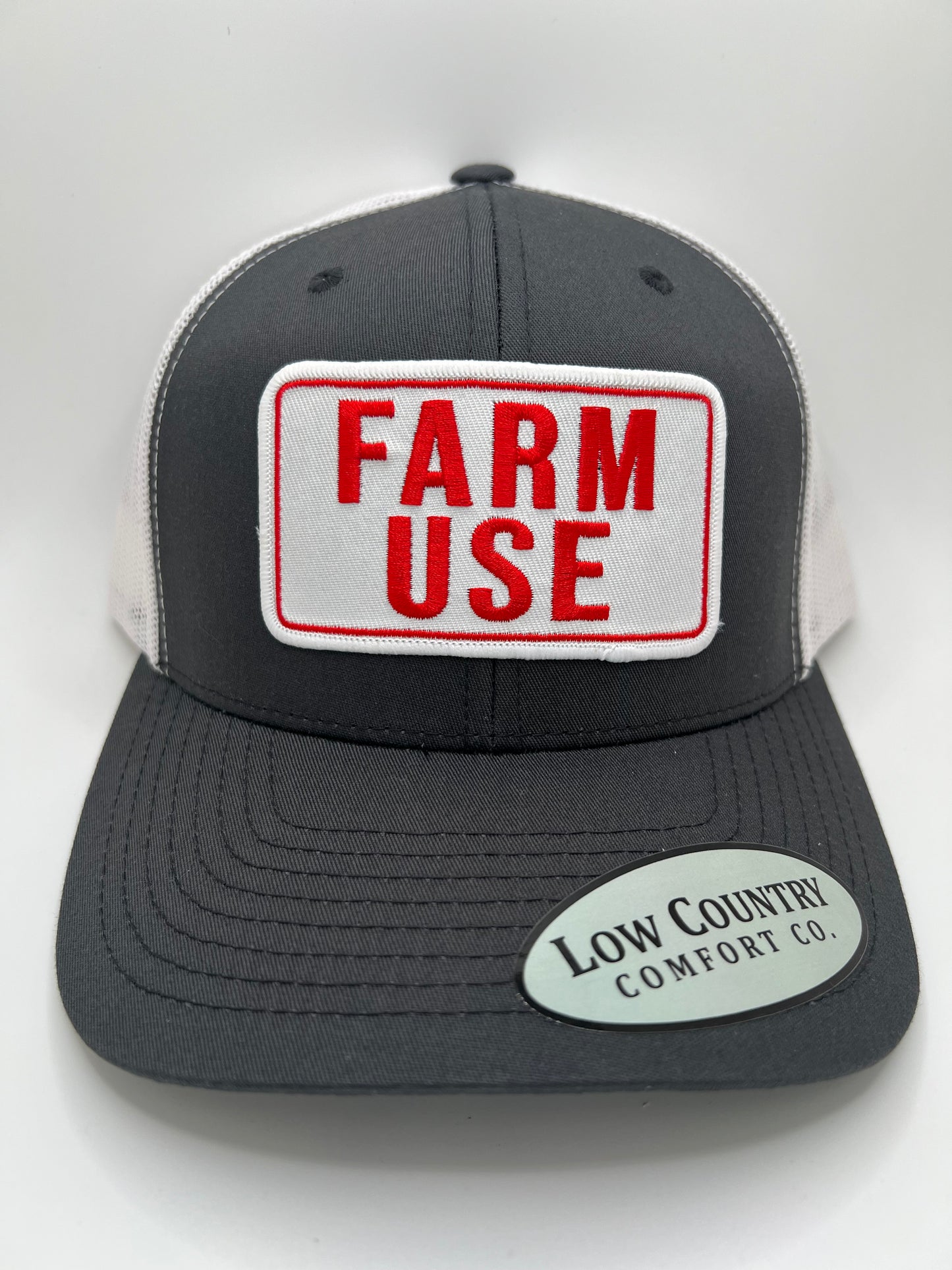 Farm Use Sublimated Patch on a Charcoal/White Trucker Hat