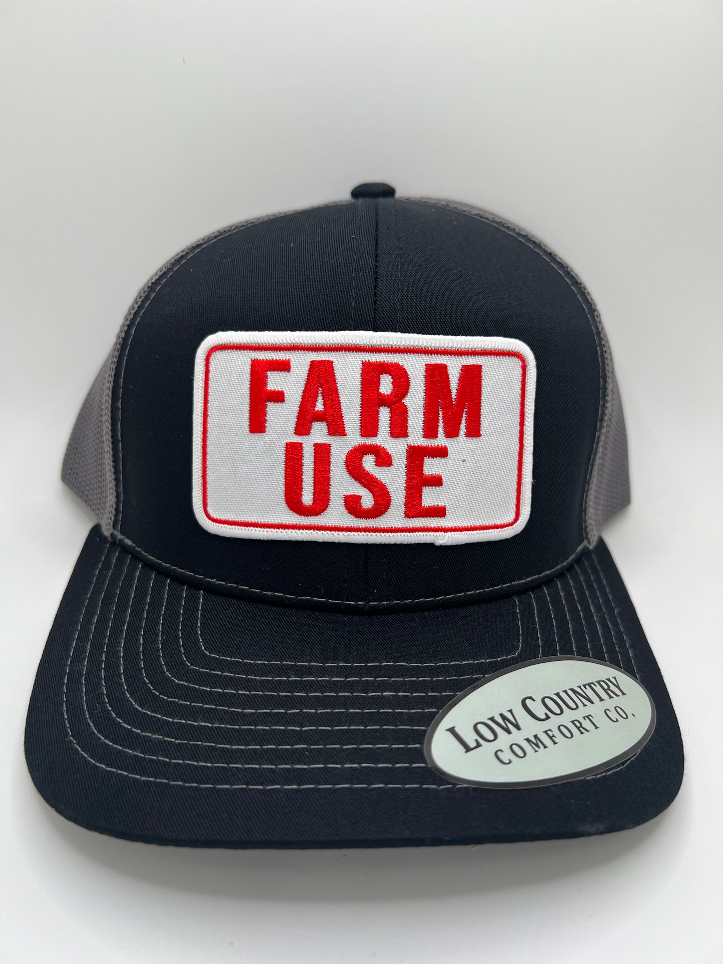 Farm Use Sublimated Patch on a Black/Charcoal Trucker Hat