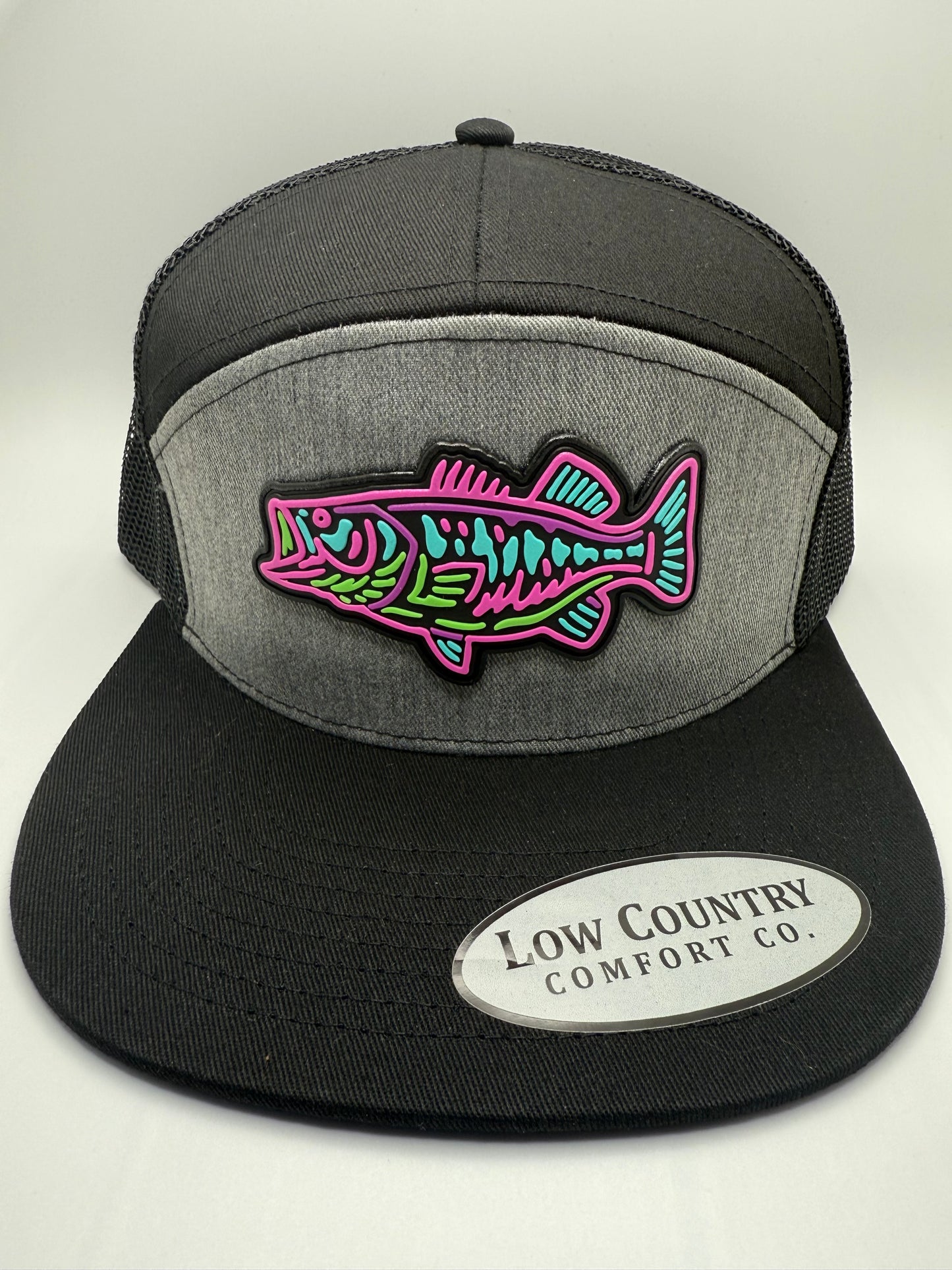 Bass Glow PVC Patch on a Riverbed Threads Heather/Black 7 Panel Hat