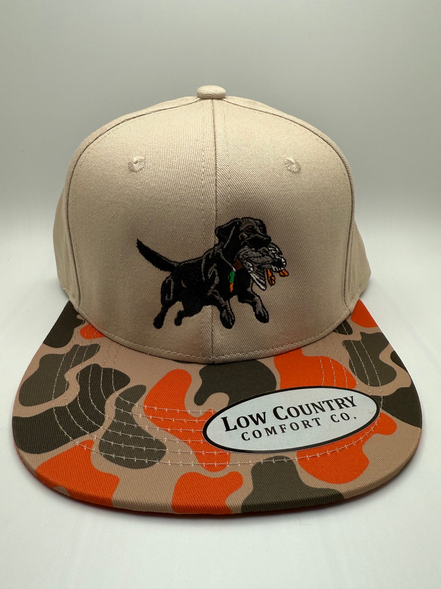 Leaping Lab Embroidered Design on a Riverbed Threads Natural/Orange Camo Hat