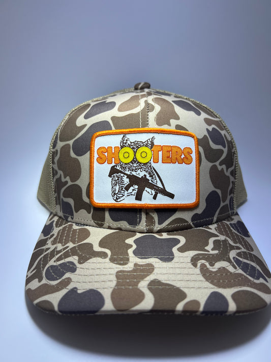 Shooters Sublimated Patch on a OS Camo/Brown RIverbed Threads Trucker Hat