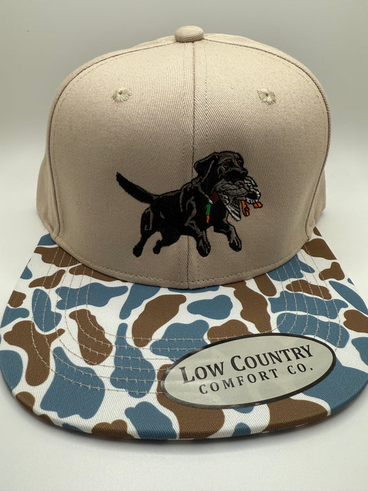 Leaping Lab Embroidered Design on a Riverbed Threads Natural/Blue Duck Camo Hat