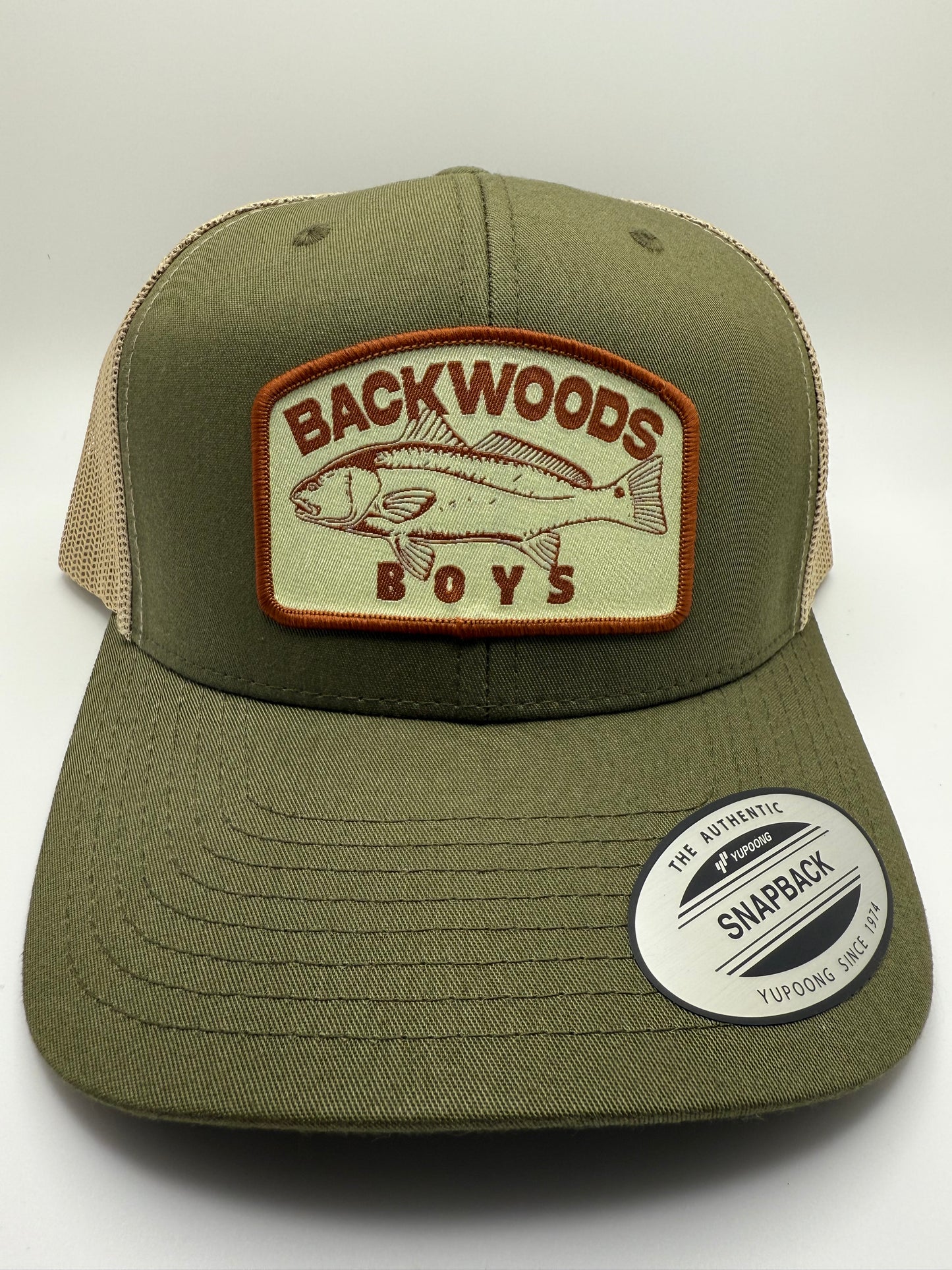 Backwoods Boys Red Drum Sublimated Patch on a Green/Khaki Trucker Hat
