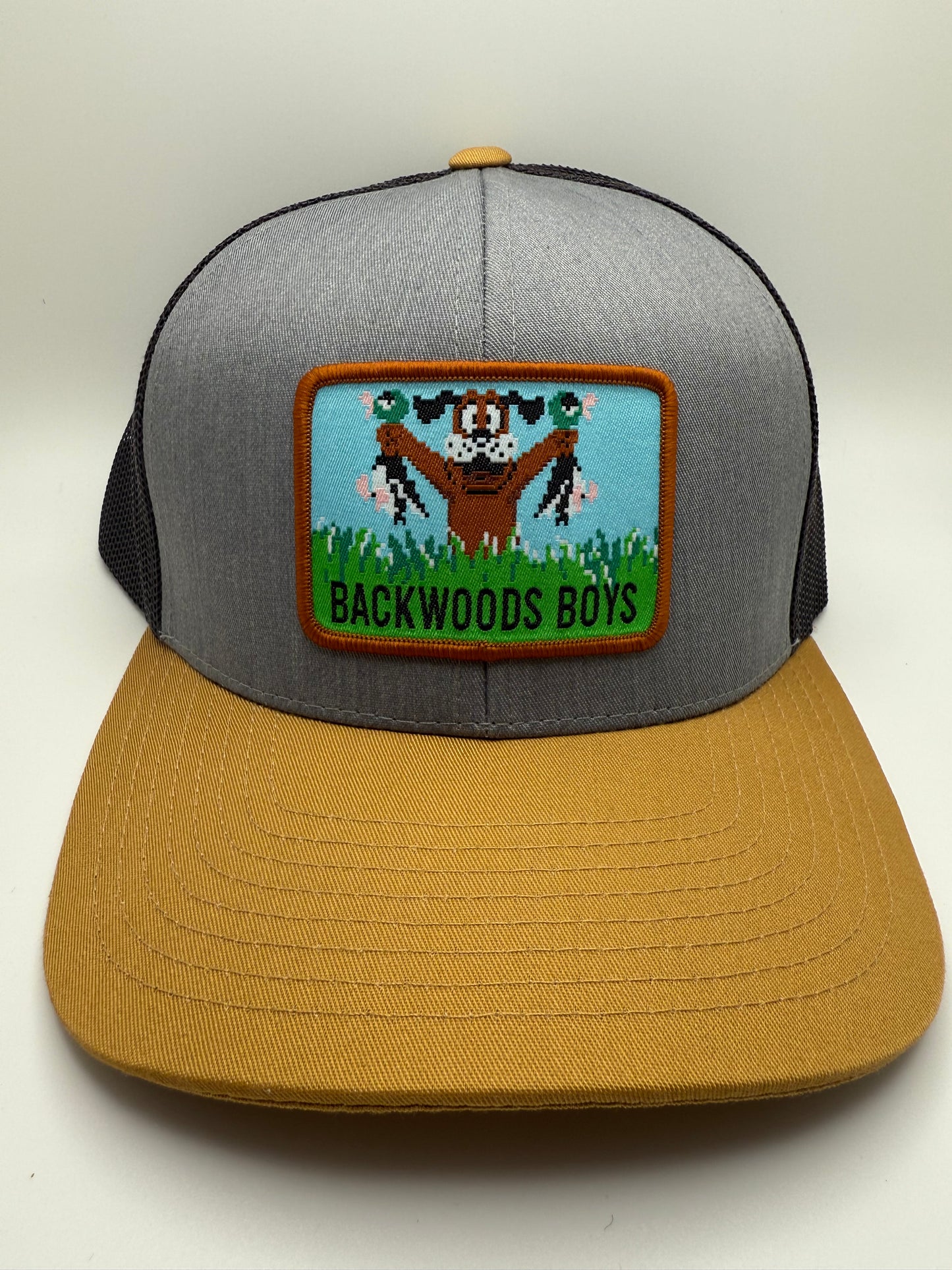 Backwoods Boys Duck Hunt Sublimated Patch on a Heather/Black/Amber Trucker Hat