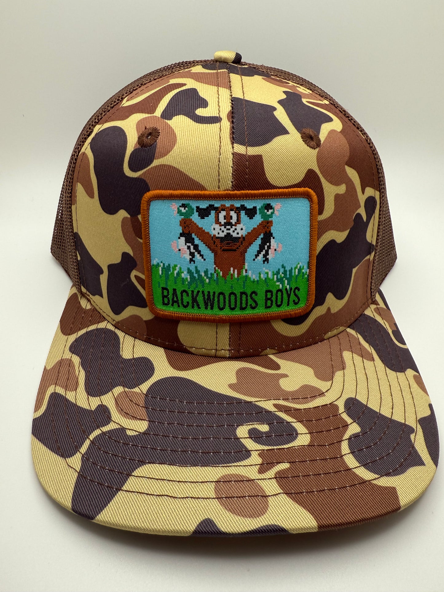 Backwoods Boys Duck Hunt Sublimated Patch on a OS Camo/Brown Trucker Hat
