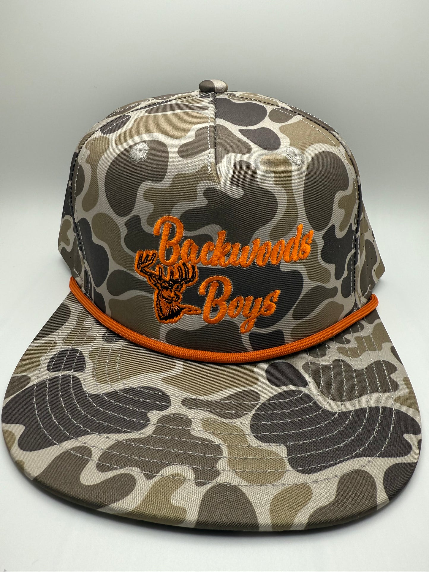 Backwoods Boys Orange Deer Embroidery on a OS Camo 5 Panel Performance Rope Hat