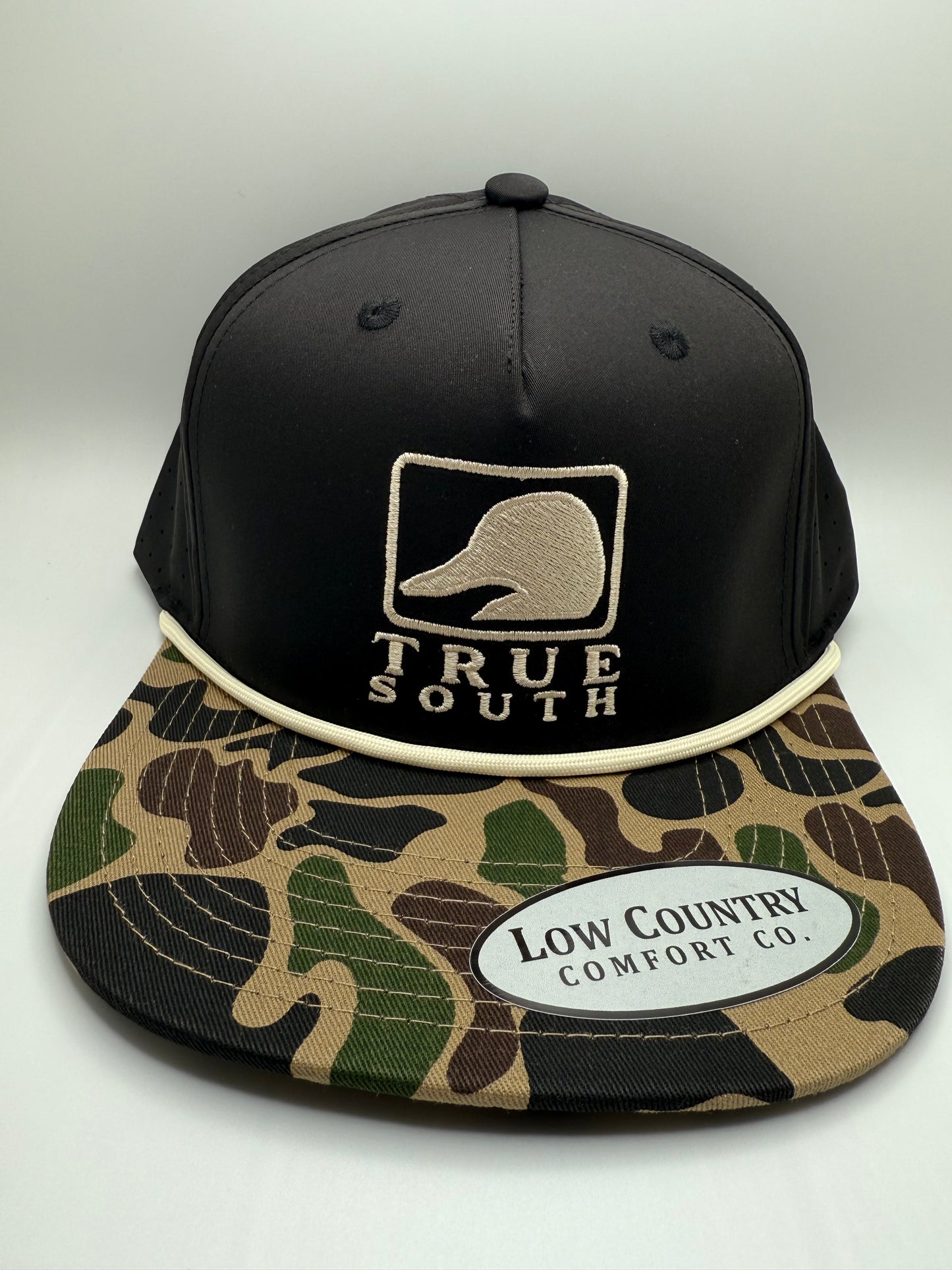 True South Square Duck Embroidery on a Black 5 Panel Riverbed Threads Performance Rope Hat with Camo Brim
