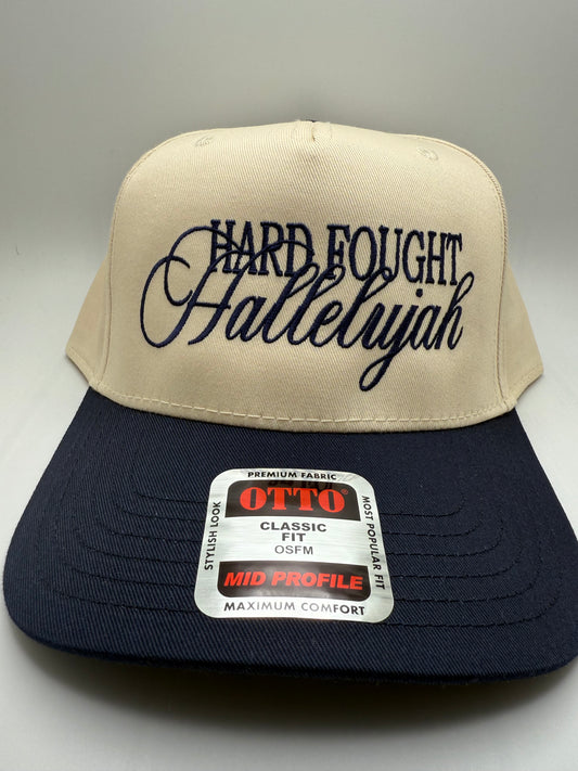 Hard Fought Hallelujah Embroidery on a Otto Natural/Navy Hat